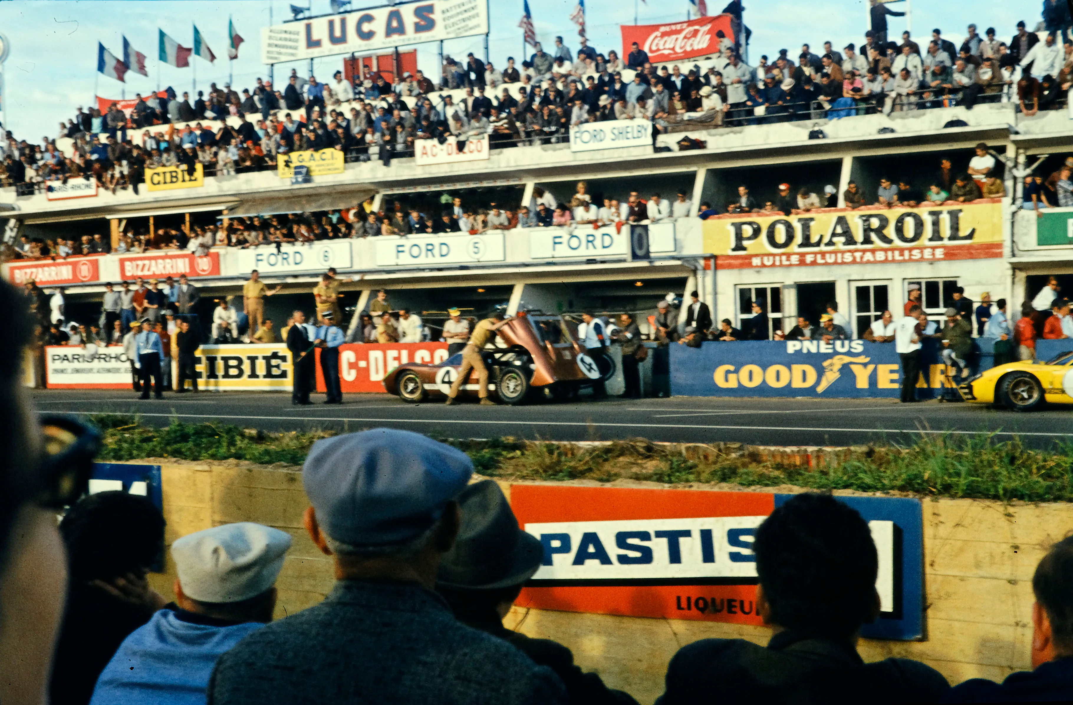 Spectators packed along the pit straight at the 24 Hours of Le Mans, 1966.