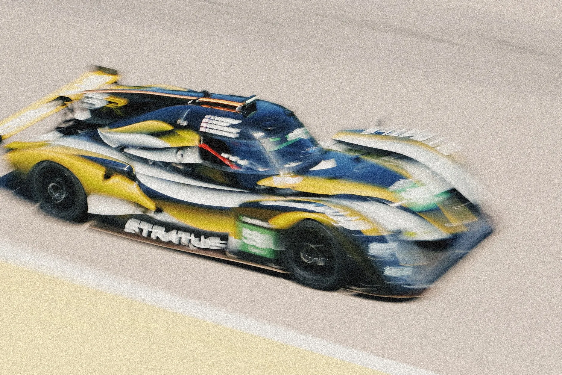 The yellow-and-black #59 Stratus Racing prototype at speed through a corner at VIR, late-day light on the trees behind.