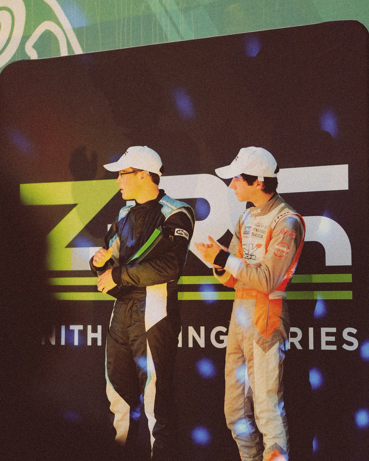 Drivers in the Zenith Racing Series paddock. What places a series on the ladder is the field it draws, not the name on the gate.