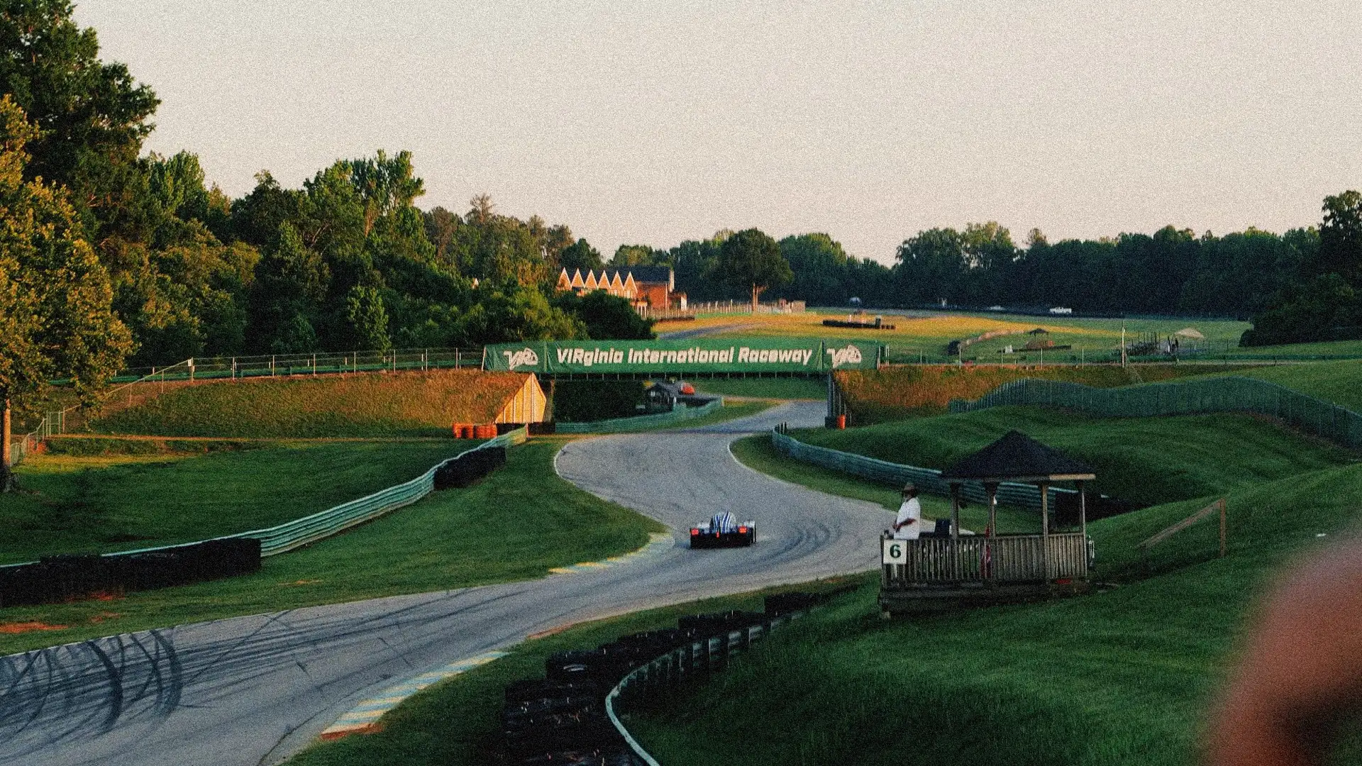 Golden hour over VIR's esses, 3.27 miles of rolling corners that take twelve hours to run and a whole field to survive.